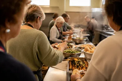 Church Kitchen Volunteers Preparing Shared Meal