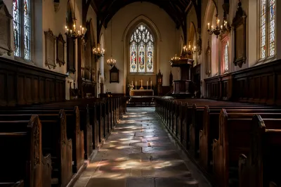 Sunlit Church Pews and Stained Glass