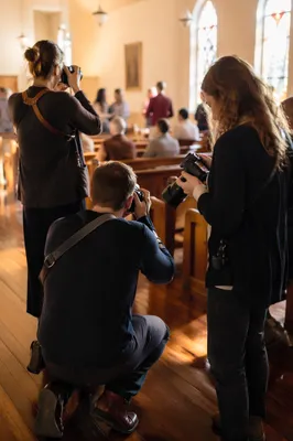 Church Photography Team Serving During Worship