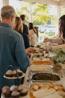 Church Potluck Fellowship Under Sunny Pavilion