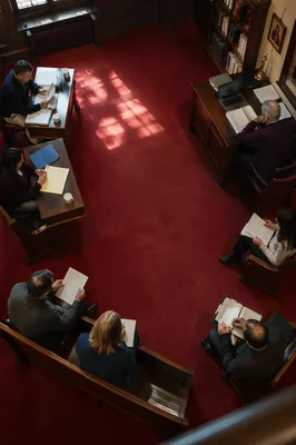 Church Staff Planning Meeting Over Red Carpet
