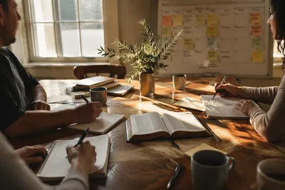 Church Staff Planning Meeting in Sunlit Fellowship Room