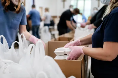 Church Volunteers Packing Community Relief Supplies