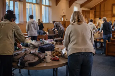 Church Volunteers Packing Donated Supplies
