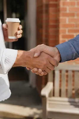 Warm Church Welcome Handshake Outside Entrance