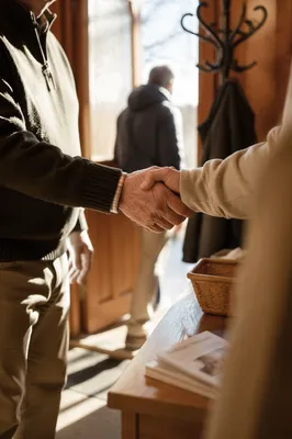 Warm Church Welcome Handshake at Chapel Doorway