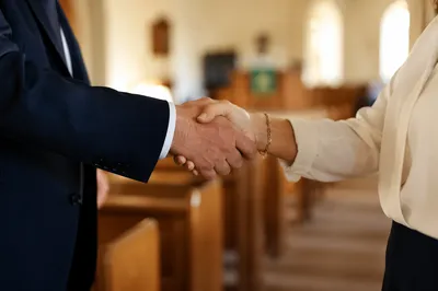 Warm Church Welcome Handshake in Sanctuary