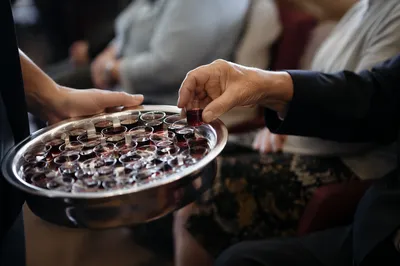 Communion Cups Passed in Church Service