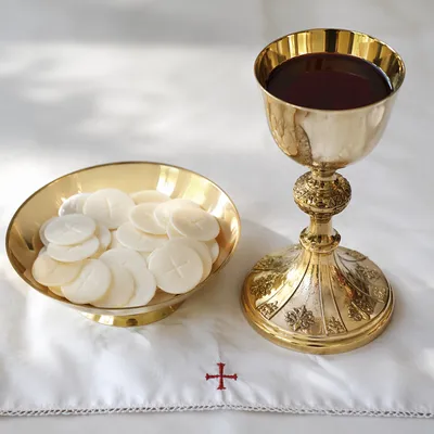 Communion Table With Bread and Chalice