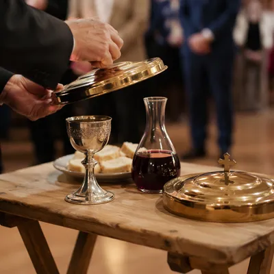 Reverent Communion Table with Bread and Chalice