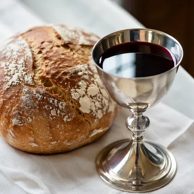 Communion Bread and Silver Wine Chalice