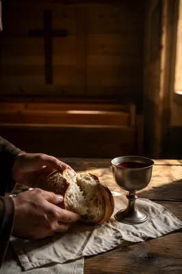 Rustic Communion Table with Bread and Chalice