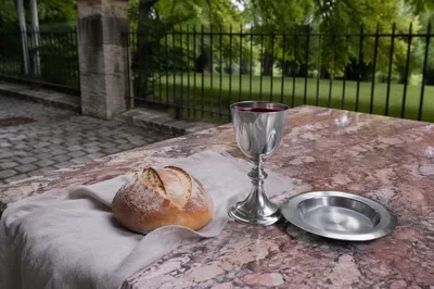 Communion Bread and Chalice in Courtyard