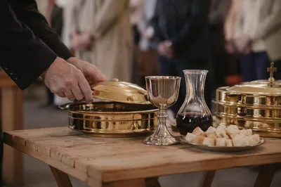 Reverent Communion Table with Bread and Chalice