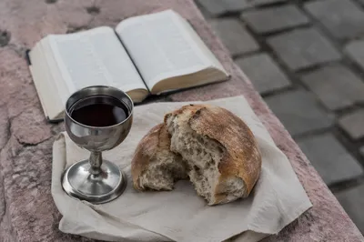 Humble Communion Table with Bread and Chalice