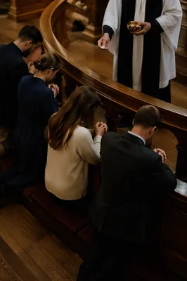 Congregation Kneeling at Communion Rail