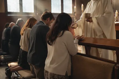 Reverent Communion at Wooden Kneeling Rail