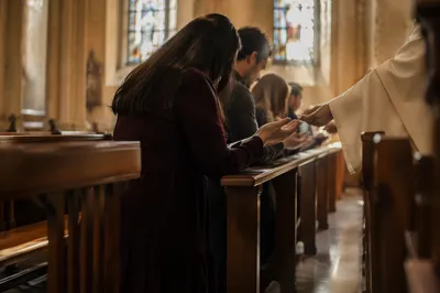 Reverent Communion at Church Kneeling Rail