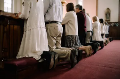 Congregation Kneeling at Communion Rail