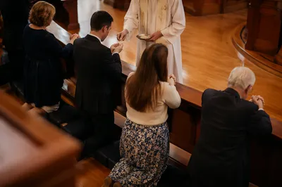 Congregation Kneeling at Communion Rail