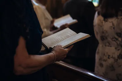 Congregation Singing Hymns in Quiet Sanctuary