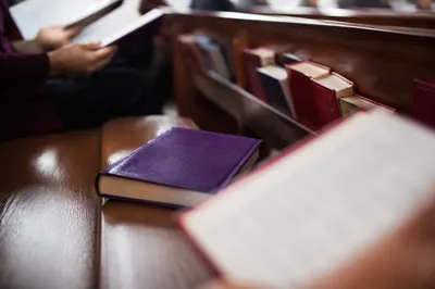 Close-Up Hymnal on Church Pew