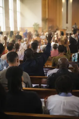 Diverse Congregation Worship in Morning Light