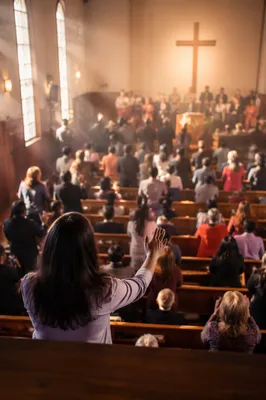 Diverse Congregation Worshiping in Warm Sanctuary