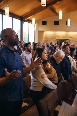 Diverse Congregation Singing in Modern Church Hall