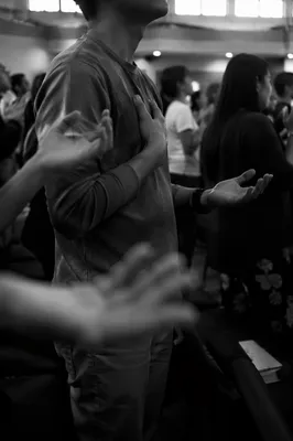 Diverse Congregation Worshiping in Modern Sanctuary