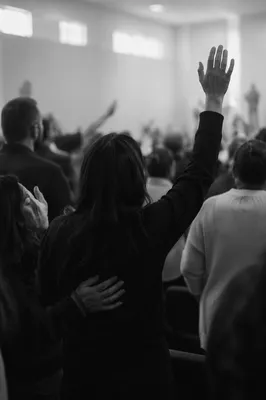 Diverse Congregation Worshiping in Modern Sanctuary