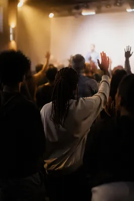 Diverse Congregation Worshiping in Modern Sanctuary