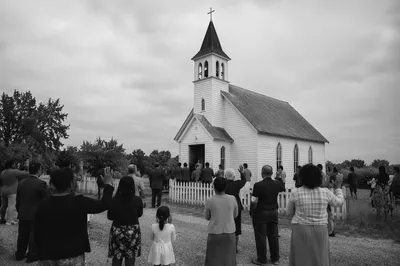 Diverse Congregation Worships Outside Rural Chapel