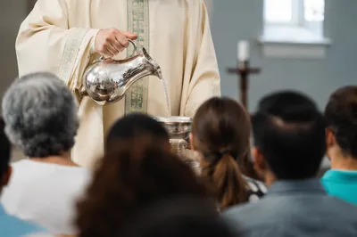 Baptismal Water Ceremony with Diverse Congregation