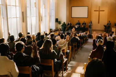Diverse Congregation Worshiping in Morning Light