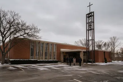 Diverse Worshippers Outside Urban Winter Church