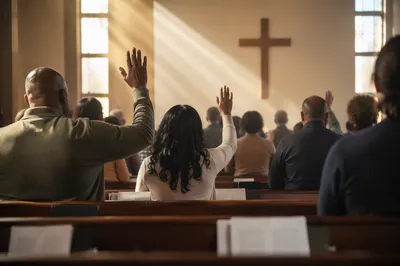 Diverse Congregation Worshiping in Morning Light