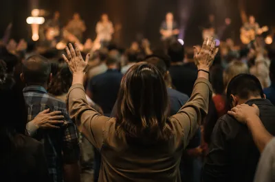 Diverse Congregation Worshiping in Modern Sanctuary