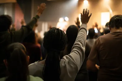 Diverse Congregation Worshiping in Modern Sanctuary