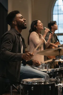 Drummer Leading Worship on Church Stage