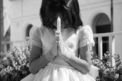 First Communion Child with Prayer Candle