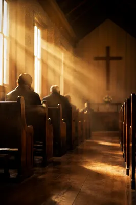 Golden Light Rays in Wooden Chapel