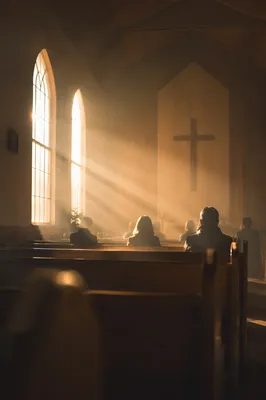 Golden Sunrise Rays in Quiet Chapel
