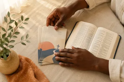 Hands Preparing Gospel Tracts for Outreach