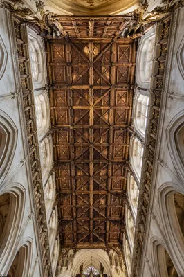 Gothic Church Nave with Ornate High Ceiling