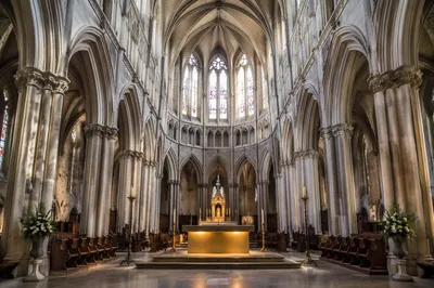 Gothic Church Nave with Illuminated Altar