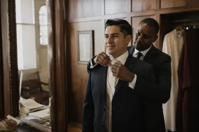 Groom Getting Ready with Best Man