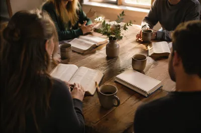 Small Group Scripture Discussion at Wooden Table