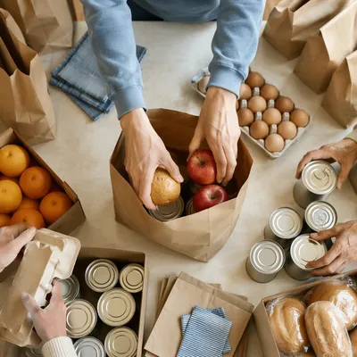 Church Volunteers Packing Food for Outreach