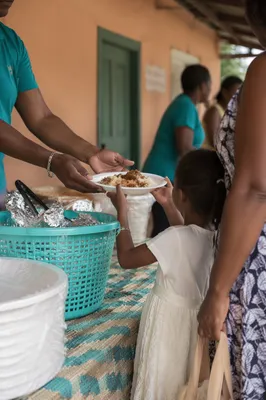 Church Hands Serving Food with Compassion